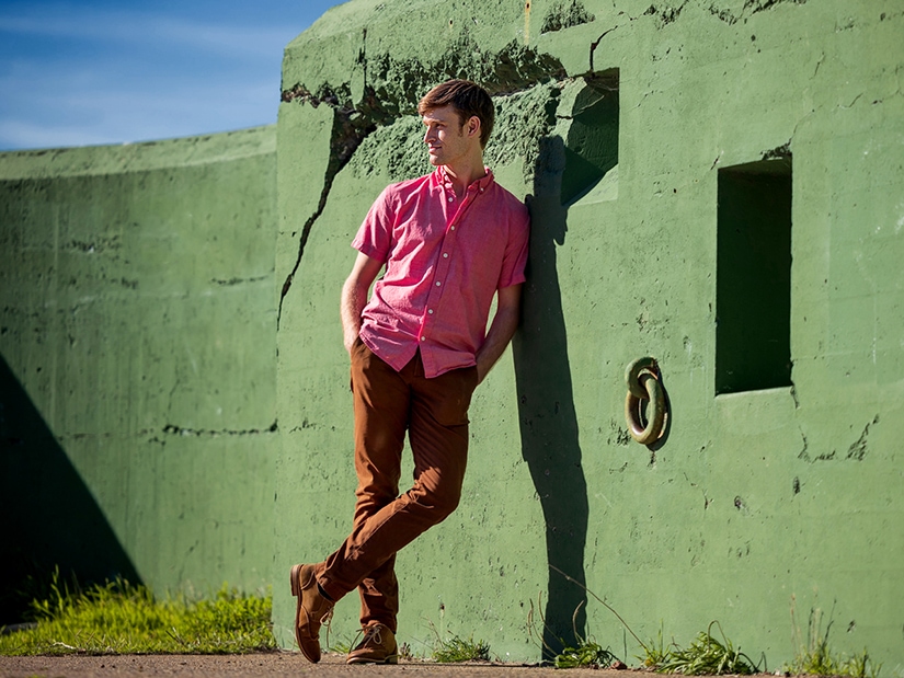 Ian leaning against a wall. Photo by Chris Hardy