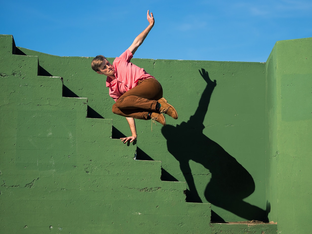 Ian Buchanan jumping off stairs. Photo by Chris Hardy
